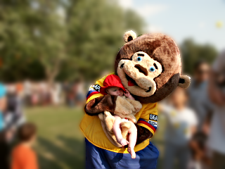 [Bear with 
Jessica with a blurred background]